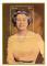 Colnect-4865-681-Queen-Elizabeth-wearing-a-yellow-dress-and-pearls.jpg