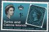 Colnect-1985-650-Queen-Eizabeth-and-old-stamp.jpg