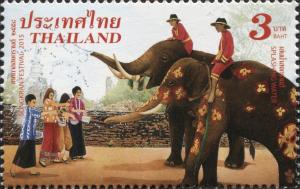Colnect-3045-186-Asian-Elephant-Elephas-maximus-splashing-Water.jpg