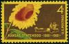 Colnect-4840-525-Kansas-Statehood-Centennial-Sunflower-Pioneer-Couple-and-S.jpg