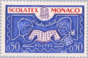 Colnect-147-936-Children-with-stamps-album.jpg
