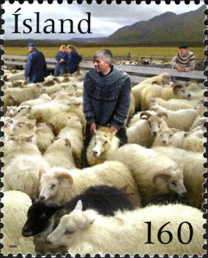 Colnect-5950-626-Shepherds-and-sheep-in-pen.jpg