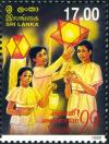 Colnect-2269-143-Young-people-with-traditional-lanterns.jpg