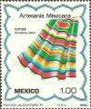 Colnect-2912-904-Textiles---A-serape-with-fringe-and-swaths-of-color.jpg