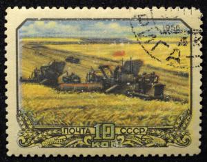 Colnect-6179-301-Combine-harvesting-of-Crops.jpg