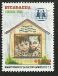 Colnect-4322-291-Children-hugging-inside-a-house-Emblem.jpg