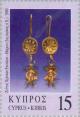 Colnect-181-731-Jewelry---Pair-of-gold-earrings-Marion-3rd-cent-BC.jpg