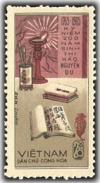 Colnect-1638-662-Writing-tools-Lamp-and-Books.jpg