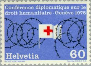 Colnect-140-560-Red-cross-flag-surrounded-by-barbed-wire.jpg