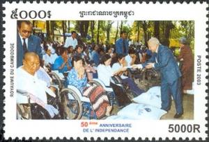 Colnect-3809-267-King-Norodom-Sihanouk-wtih-handicapped-people.jpg