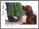 Colnect-1955-110-Dog-at-the-Feet-of-a-Love-Couple.jpg