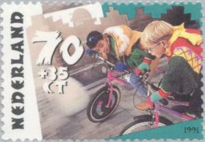 Colnect-178-008-Children-cycling.jpg