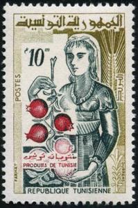 Colnect-899-406-Woman-holding-pomegranates.jpg