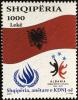 Colnect-3834-383-Albanian-flag-UNHRC-emblem.jpg