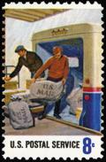 Colnect-4208-177-Postal-Service-Loading-Mail-on-a-Truck.jpg