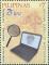 Colnect-2853-185-Magnifying-Glass-Laptop.jpg