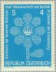 Colnect-137-050-UNO-scientific-meeting-flower-badge.jpg