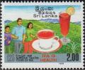 Colnect-2530-289-Family-and-glas-of-tea.jpg