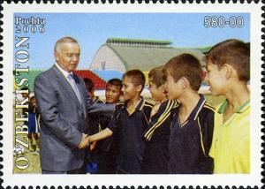 Colnect-2431-229-Islam-Karimov-and-young-sportsmen.jpg