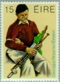 Colnect-128-610-Playing-Uilleann-pipes.jpg