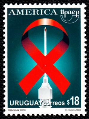 Colnect-1346-194-Syringe-and-red-ribbon.jpg