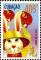 Colnect-1629-030-Rabbit-in-Chinese-costume-with-balloons.jpg