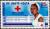 Colnect-507-603-Nurse-in-front-of-hospital.jpg