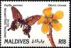Colnect-2371-664-Great-Mormon-Papilio-memnon-Flower-Dillenia-obovata.jpg