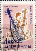 Colnect-2714-599-Hyang-pipa-Chinese-short-lute.jpg
