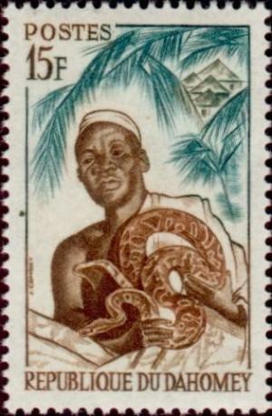 Colnect-992-655-Ouidah-witch-doctor-and-python.jpg