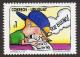 Colnect-1461-707-Boy-looking-at-stamps-in-album.jpg
