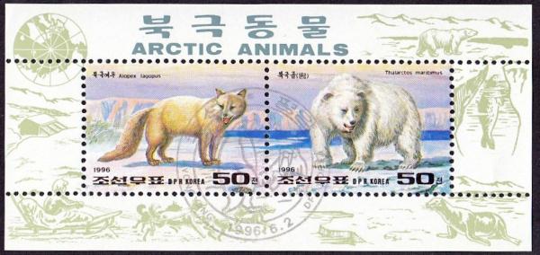 Colnect-2520-023-Arctic-Fox-Alopex-lagopus-Polar-Bear-Ursus-maritimus.jpg