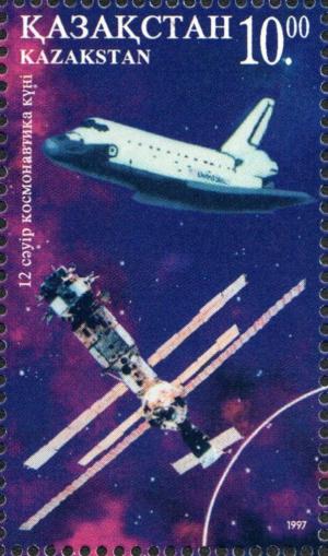 Colnect-4692-751-Space-shuttle-and--Mir--space-station.jpg