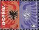 Colnect-1539-633-NATO-emblem-and-heraldic-eagles.jpg