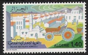 Colnect-1295-374-Village-and-tractor.jpg