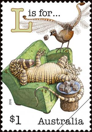 Colnect-3486-274-L-is-for-Lyrebird-on-lounge-Lace-monitor-Lamingtons-on-log.jpg