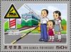 Colnect-6777-943-Family-At-Rail-Crossing.jpg