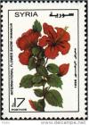 Colnect-2219-521-International-Flower-Show--Red-hibiscus.jpg