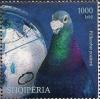 Colnect-1540-605-Globe-and-pigeon-Columba-livia-domestica-without-mail-bag.jpg