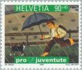 Colnect-141-460-Boy-with-umbrella---dog-in-the-rain.jpg