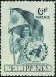 Colnect-2320-450-UN-Emblem-and-Girl-Holding-Flag.jpg