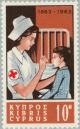 Colnect-170-566-Centenary-International-Red-Cross---Nurse-tending-child.jpg