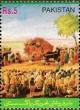 Colnect-2158-242-Bullock-carts-and-crowd-carrying-Pakistan-flag.jpg