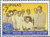 Colnect-2875-905-Signing-of-SSS-Law-RA-1161.jpg