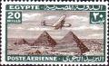 Colnect-1280-916-Aircraft-flying-over-the-Pyramids-of-Giza.jpg