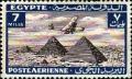 Colnect-1282-018-Aircraft-flying-over-the-Pyramids-of-Giza.jpg
