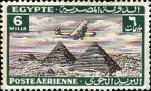 Colnect-1282-017-Aircraft-flying-over-the-Pyramids-of-Giza.jpg
