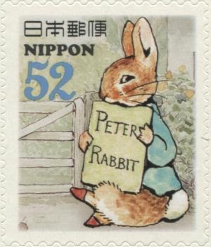 Colnect-3046-962-Peter-Rabbit-Holding-Placard-Peter-Rabbit-Characters.jpg