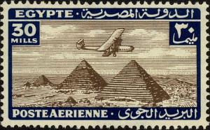 Colnect-3914-934-Aircraft-flying-over-the-Pyramids-of-Giza.jpg