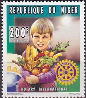 Colnect-5181-194-Boy-holding-fruits-and-vegetables.jpg